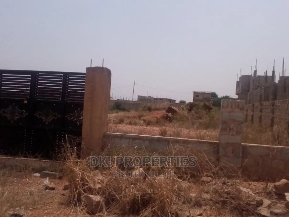 Photo of a fenced and gated 100 X 70 titled plot of land in a rapidly developing area of Amrahia, Adenta.