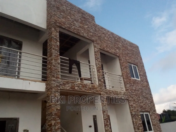 Exterior photo of the newly-built block of 4 two-bedroom flats for sale in Amanfrom, Adentan.