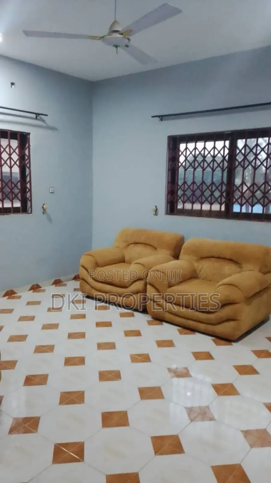 Oyarifa 2 (1) Interior view of a neat and spacious unfurnished Chamber and Hall (1-bedroom self-contained) apartment in Oyarifa, showing the tiled floor, Pop Ceiling, and fitted kitchen area.