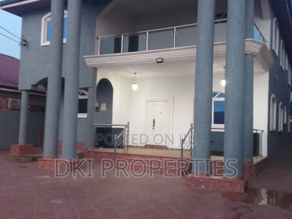 Exterior view of a newly-built, semi-furnished 5-bedroom executive detached house in Lakeside Estate, Adenta, showing the spacious paved compound and secure environment.